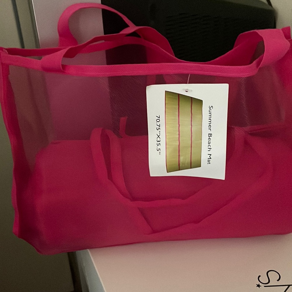 Summer beach mat with a carrier bag